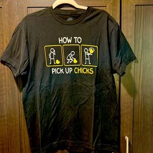 Men’s black t-shirt, size L. “How to pick up Chicks”